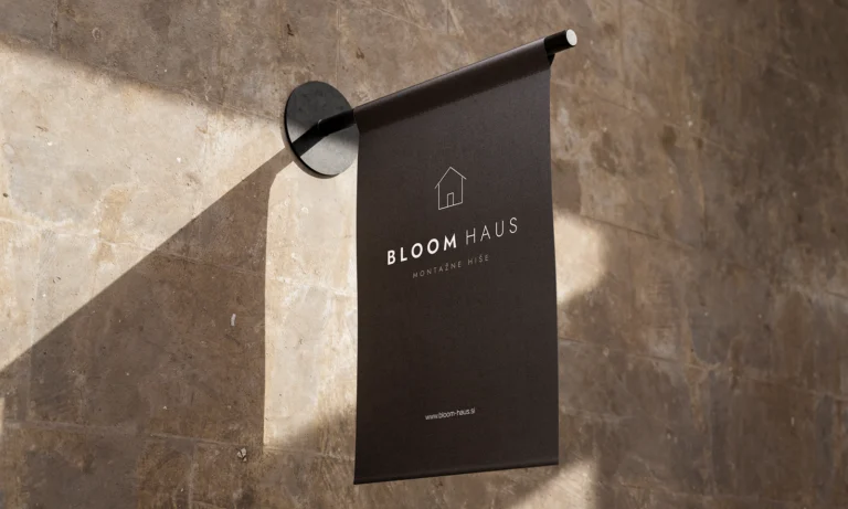 Logotip za Bloom Haus: mockup brenda na visećoj ploči uz zid